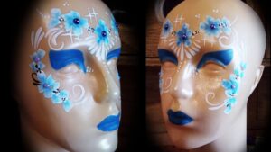 Descubre el encanto del maquillaje artístico con flores: colores vibrantes y Bellezas únicos te esperan. ¡Resalta tu Belleza de manera original y creativa!